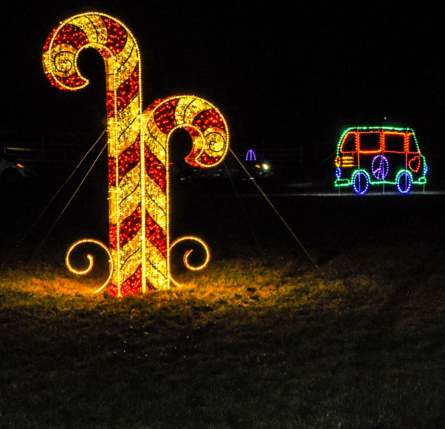 What would a holiday-themed light show at Bethel Woods be without a peace sign and hippie van lining the route?